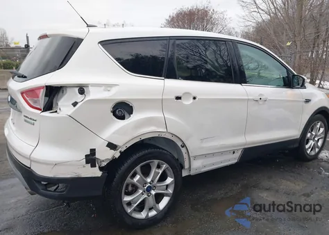 2015 Ford Escape Titanium z USA, uszkodzony, nr VIN 1FMCU0JX6FUB79686